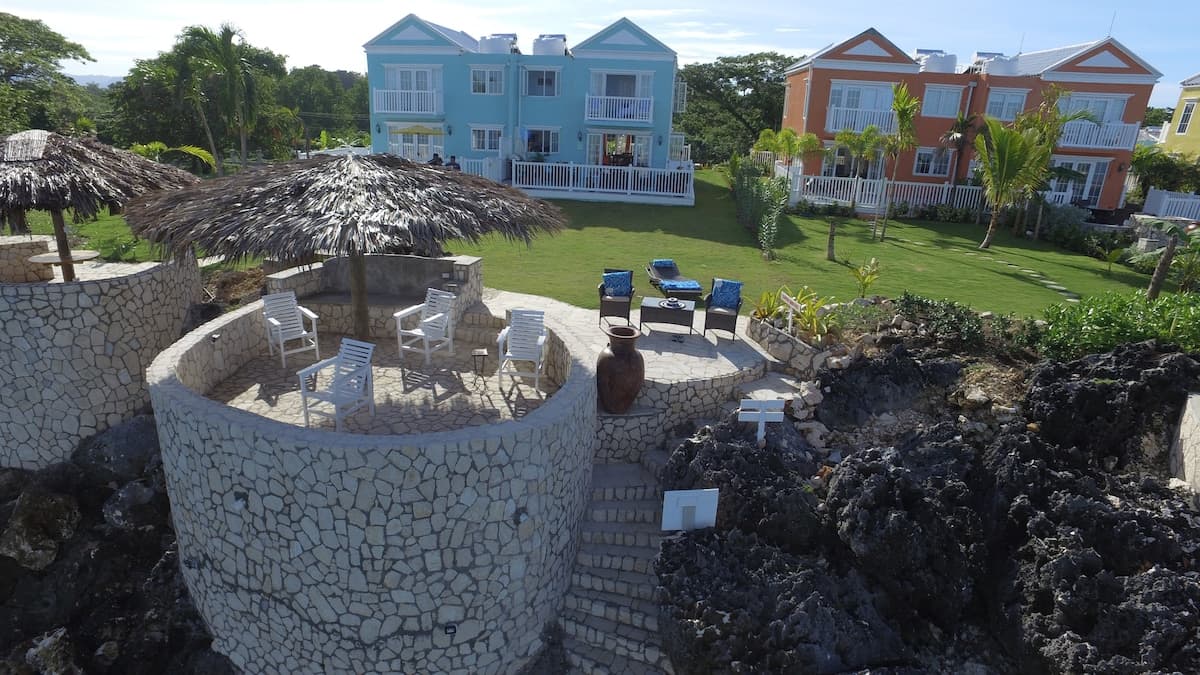 Our beautiful townhouse with its lovely green space, patio seating and direct access to the water below